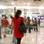 Woman-entering-in-the-shopping-mall-entrance.jpg-[1]