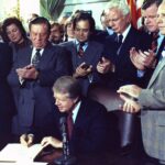 Jimmy Carter signs Airline Deregulation Act of 1978 circa 24 October 1978