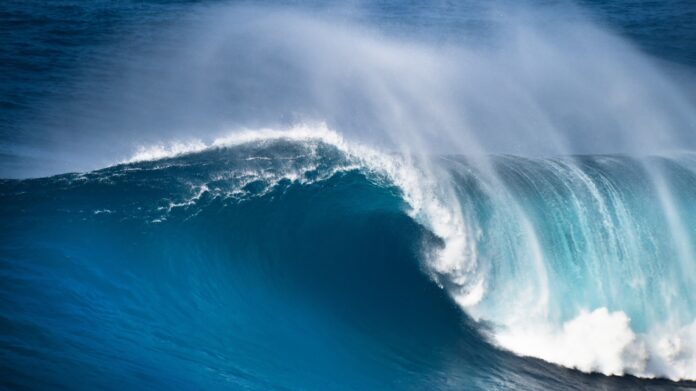 Huge ocean wave breaking on the North Shore of Maui