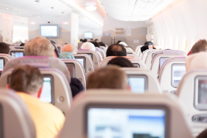 Passengers in the airplane.